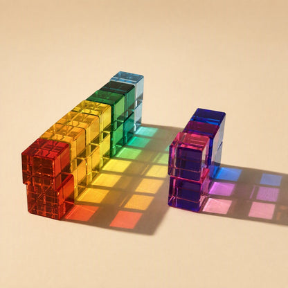 Translucent acrylic gemstone building blocks in cube, strip, and cylindrical shapes