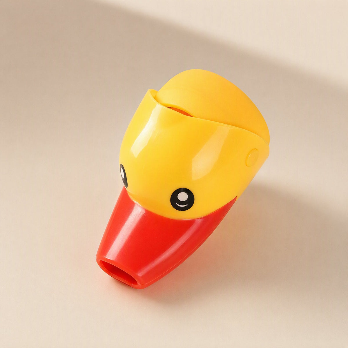 Cartoon faucet water guide for children, described as a splash-proof faucet extender