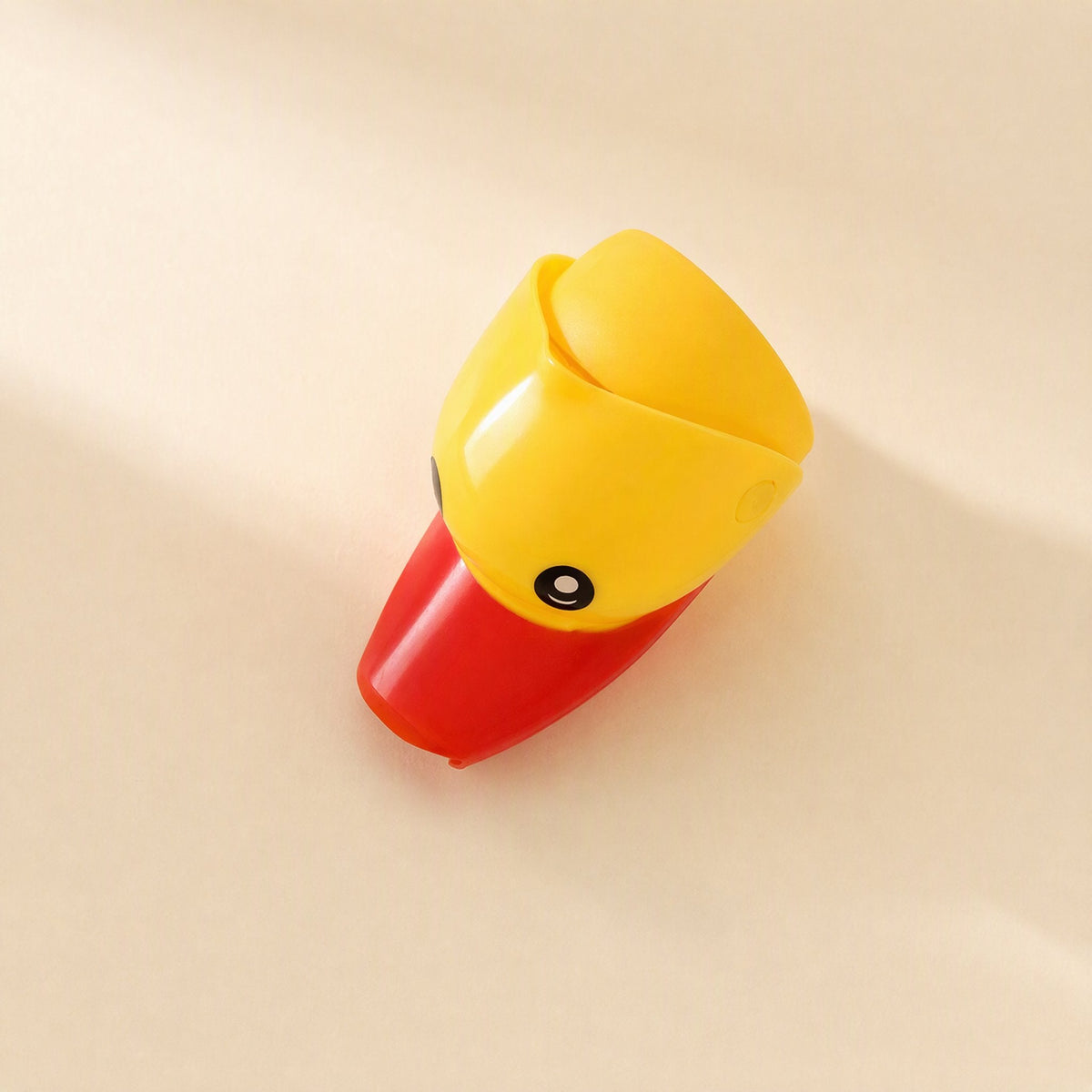 Cartoon faucet water guide for children, described as a splash-proof faucet extender - view 2