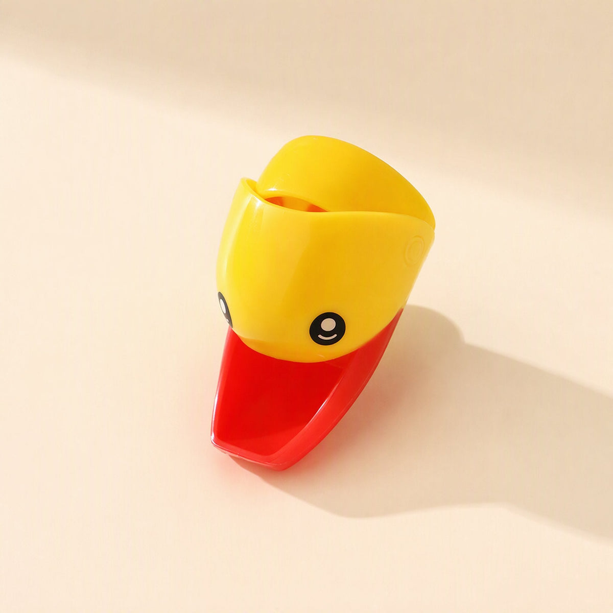 Cartoon faucet water guide for children, described as a splash-proof faucet extender - view 4