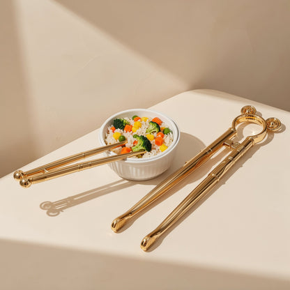Children’s plastic training chopsticks with an automatic return mechanism and round-head style