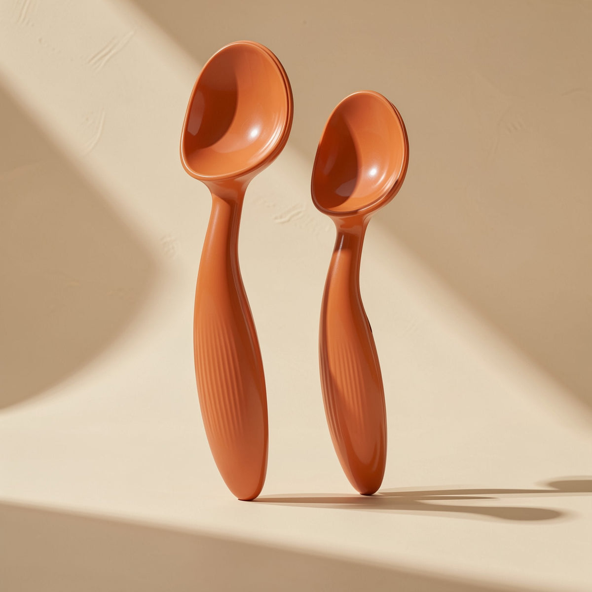 Tinyspoon baby feeding spoon and fork with a curved-head soup spoon