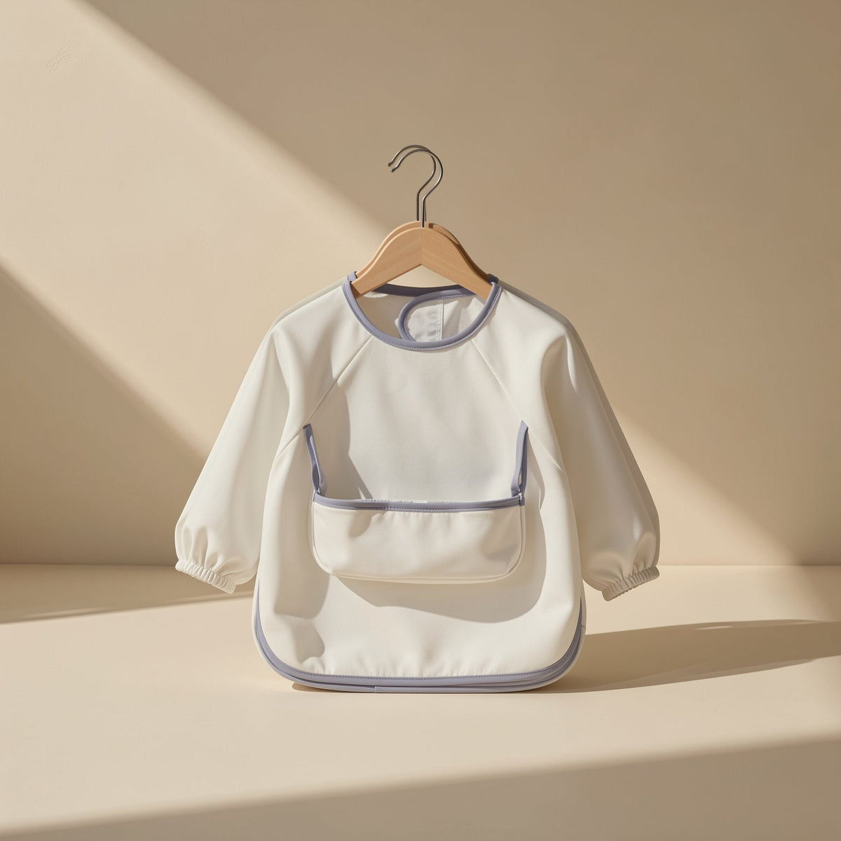 Long-sleeve toddler feeding bib with an enlarged pocket - view 2