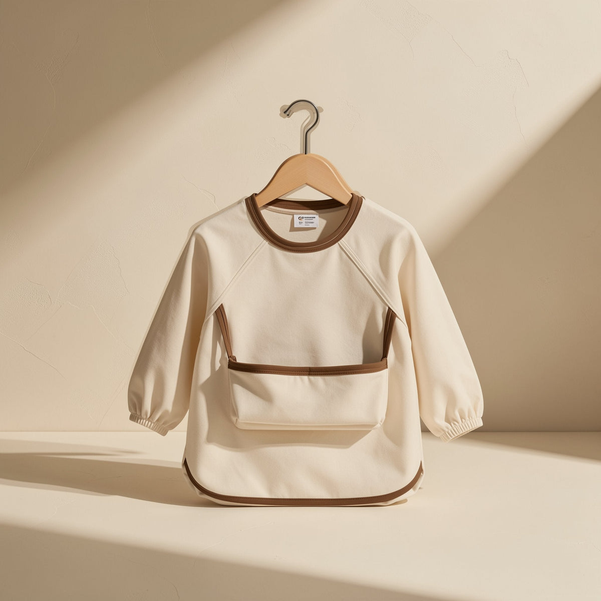 Long-sleeve toddler feeding bib with an enlarged pocket - view 3