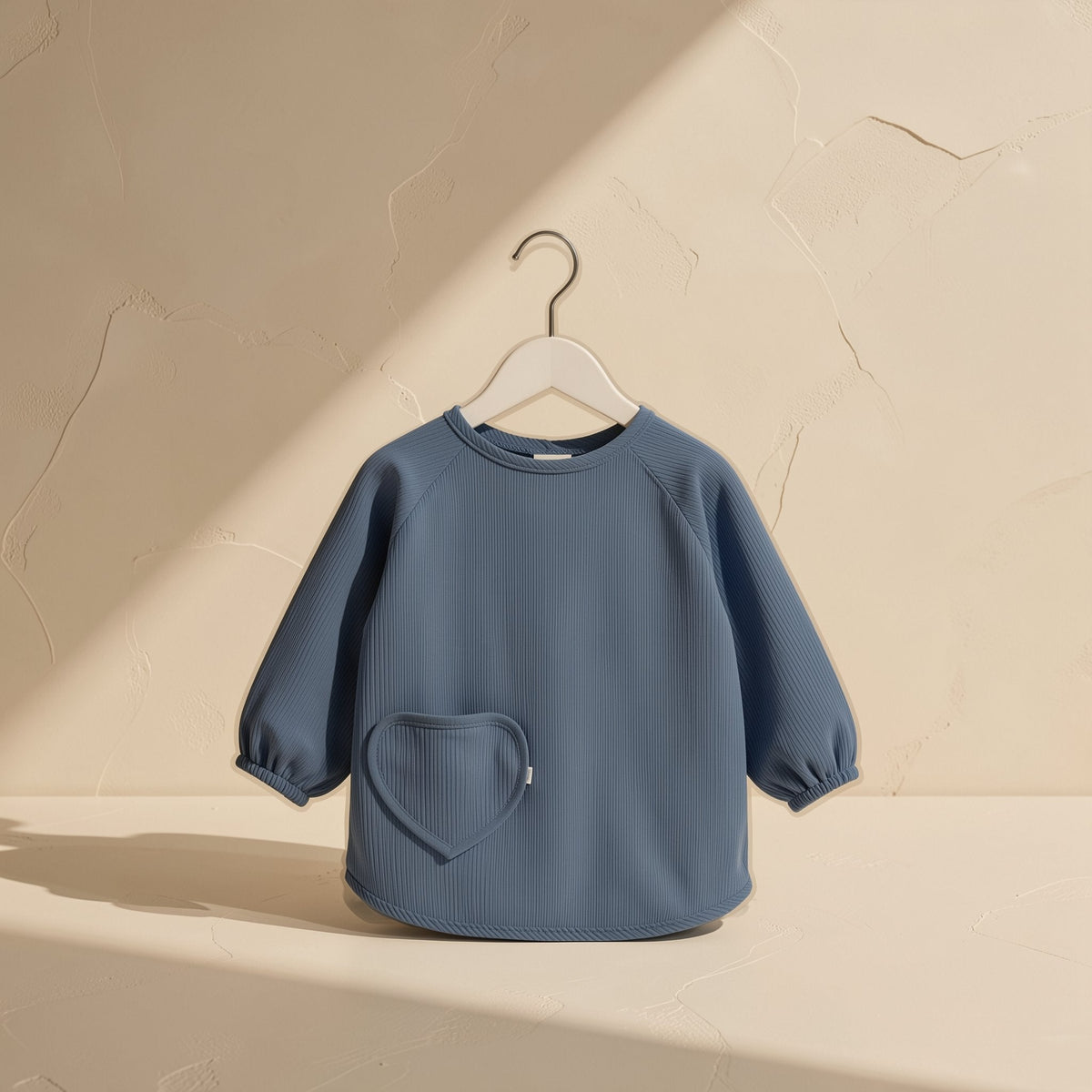 Long-sleeve baby bib made from 100% polyester