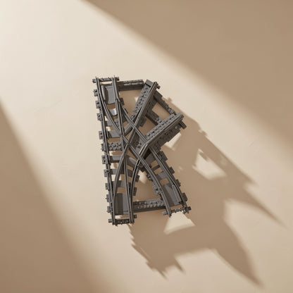 ABS plastic building block train track parts with straight, curved, branching, and crossing forms