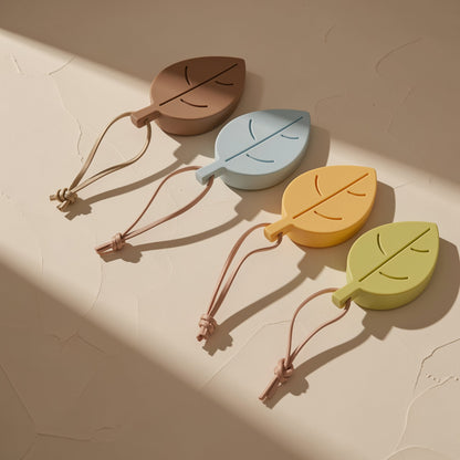 Leaf-shaped silicone door stop described as thickened, windproof, and an anti-pinch hand safety door card