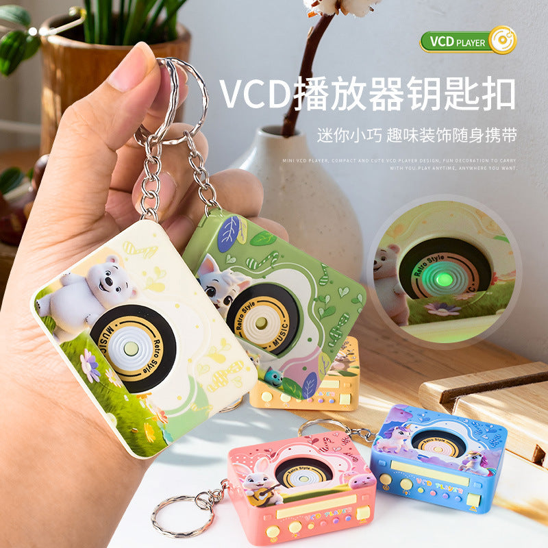 New Kidsren's Artificial Vcd Walkman Toy Mini Cartoon Light Music Player Keychain Pendant - image 1
